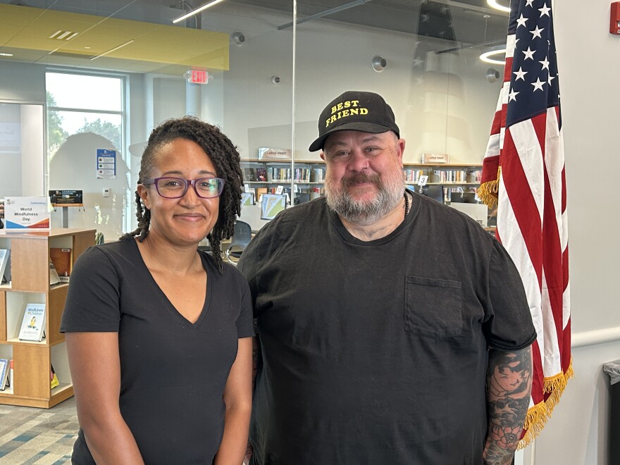 Candace Potter (left) of Kettering and Tony Barnes of Dayton met at the Huber Heights Branch of the Dayton Metro Library to talk about online polarization and how face-to-face conversation can be a relief.