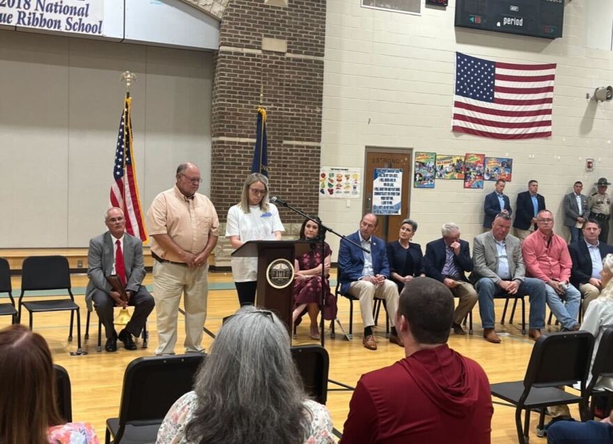 Megan Vanhook speaking alongside Judge-Executive David Westerfield at the remembrance event.