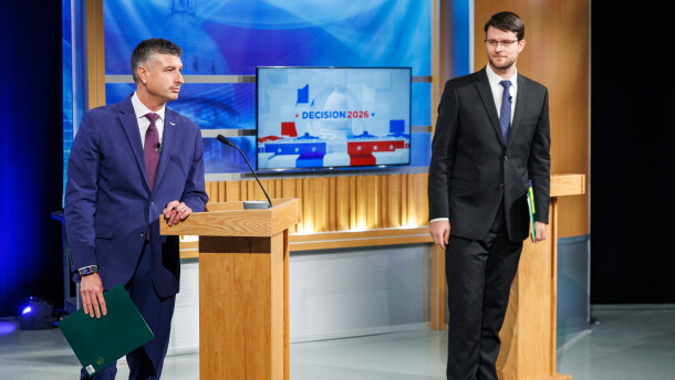 U.S. Rep. Tom Barrett, R-Charlotte, left, and Democratic nominee for U.S. House William Lawrence, right, after the conclusion of their first head-to-head debate at WKAR's studios in East Lansing, Mich., on Oct. 6, 2026.