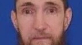 Thomas Ray Blevins—also known as "Tommy Guns"—had been on the run since January 16th, following a shootout at a vacant estate on Nine Foot Road.