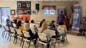 Representative John James speaks to veterans and others in Grand Haven.