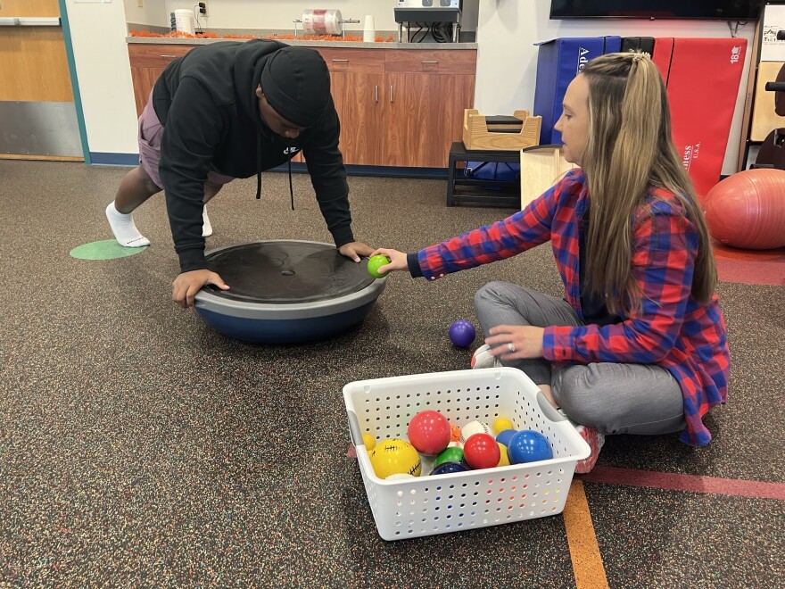 Aaron Hunter doing physical therapy at Johns Hopkins All Children's Hospital's outpatient center in Sarasota on Oct. 12, 2023. After getting shot in the head last June, Aaron struggled with weakness and balance on the left side of his body. He spent months in physical therapy before being discharged in February.