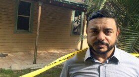 Ahmed Bedier, a Muslim community activist, stands outside the Fort Pierce mosque, damaged in arson attack this week. He says Clinton's comments were probably "unwise" but "honest."