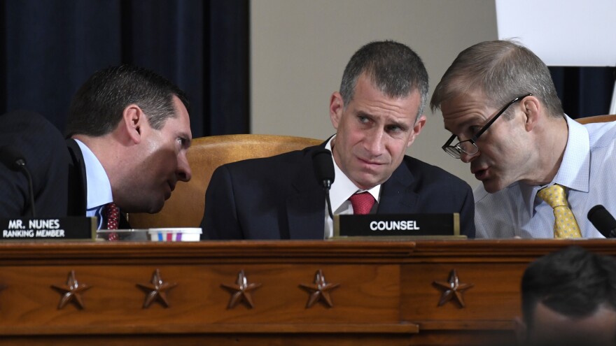 Republican staff attorney Steve Castor (center) is assisting Republican Reps. Devin Nunes (left) and Jim Jordan with questioning during the open impeachment hearing on Wednesday.