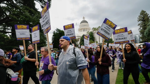 State workers represented by SEIU Local 1000 strike at the state Capitol in Sacramento on Oct. 21, 2026.