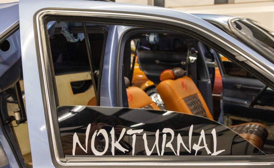Window of a car that says “Nokturnal." Photo by Alexander Brown