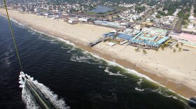 The view shown while parasailing above the Atlantic Ocean off the coast of the New Jersey Shore. Do you spy the Italian-American stars of MTV's <em>Jersey Shore</em>?
