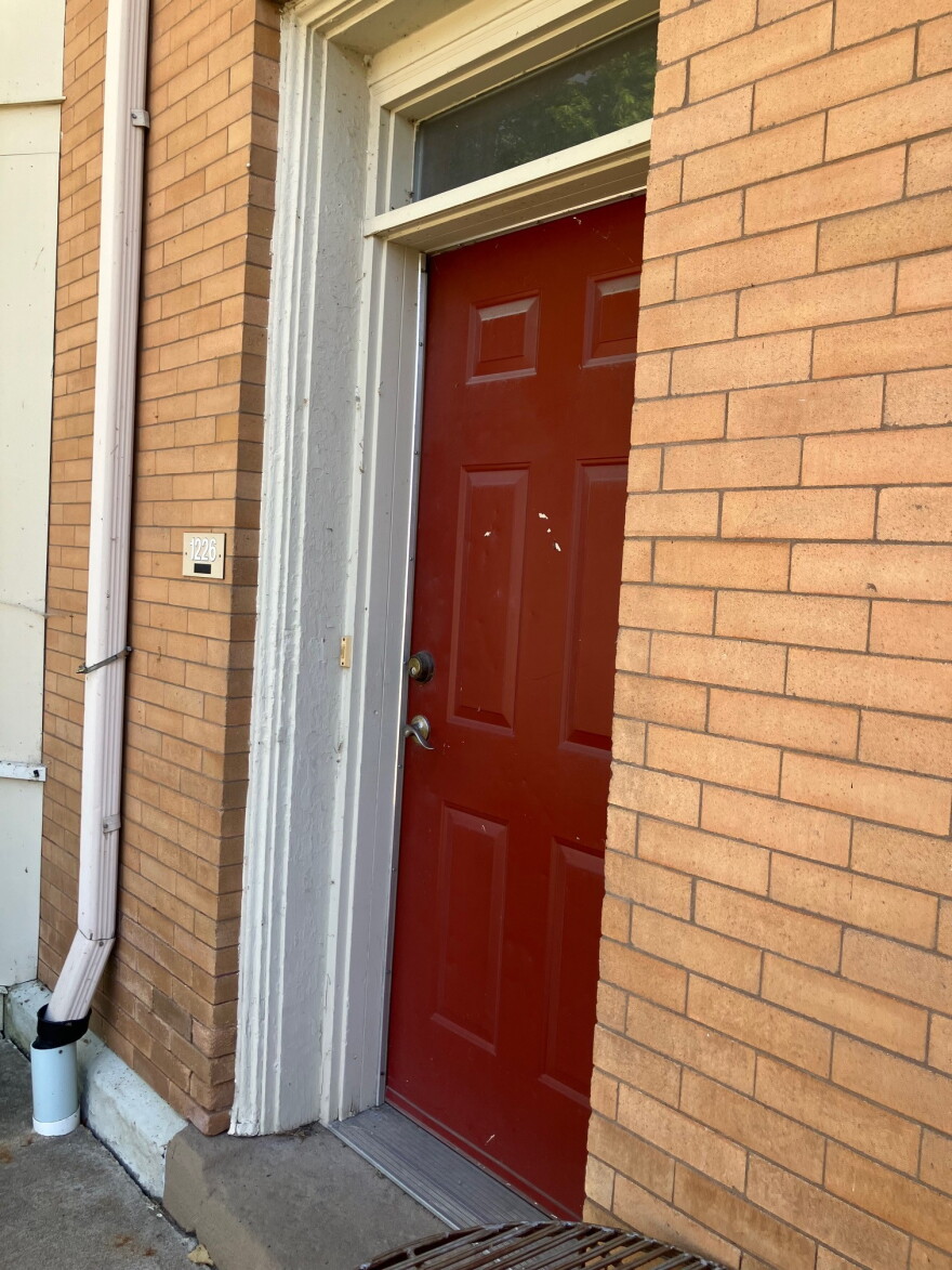 The door to her former unit, 1226 4th Ave., Rock Island, after her eviction, seen Sept. 7, 2026.