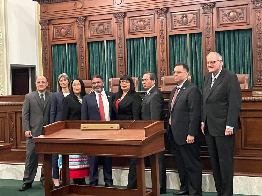 Alicia Stroble stands with Muscogee lawyers and Principal Chief David Hill for an Oklahoma Supreme Court hearing in January 2024.