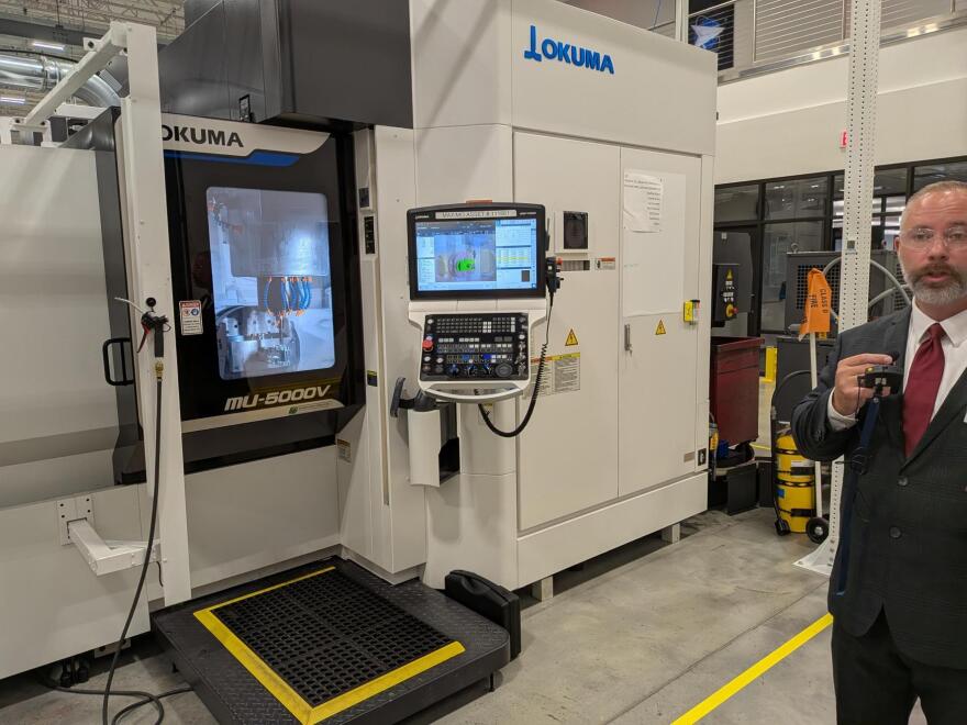 Moog's new Advanced Integrated Manufacturing facility features many high-tech tools used to make precision parts, like this CNC milling machine.