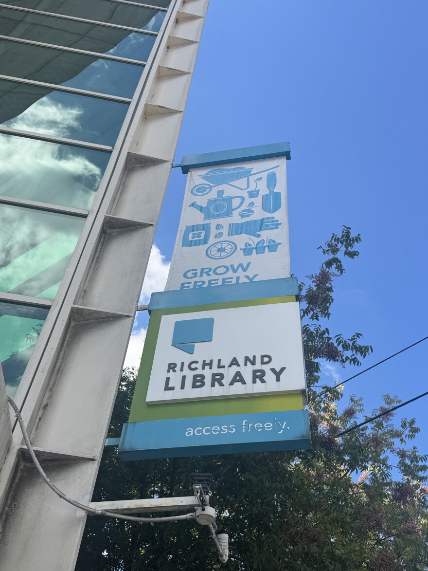 The Richland Library Main banner and sign in downtown Columbia.