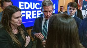Gov. Bill Lee, accompanied by Arkansas Gov. Sarah Huckabee Sanders, left, at a press conference at which he announced a plan to let parents use public funds for private schools.