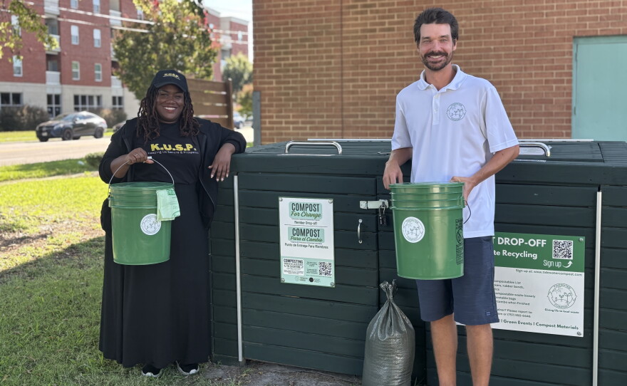 Jay Boone, executive director of KUSP, and Cameron Kania, CEO of Tidewater Compost, stand at a composting dropoff station at the Berkley Community Center in Norfolk on Sept. 9, 2026.