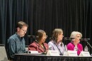 Fort Wayne city officials, including Mayor Sharon Tucker (2nd from left) address the crowd at a public hearing for the proposed Anchor Resource Center. The low-barrier shelter would offer services to the city's unhoused population.