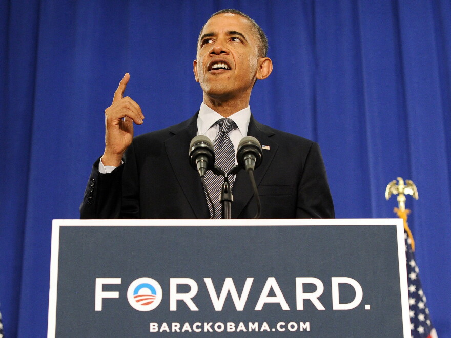 President Barack Obama speaks on the economy during a campaign event at the Cuyahoga Community College in Cleveland, Ohio, on June 14. The President delivered a major economic address Thursday night in which he drew stark, numerical contrasts between his and Gov. Romeny's plans to improve the economy.