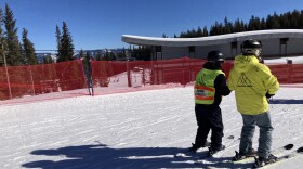  Scott Jernigan, left, skis down the Elk Camp Meadows run on the Snowmass Ski Area on Sunday, Dec. 11. The nonprofit Challenge Aspen hosted Jernigan and his classmates from the Tennessee School for the blind over the weekend, teaching them how to ski.