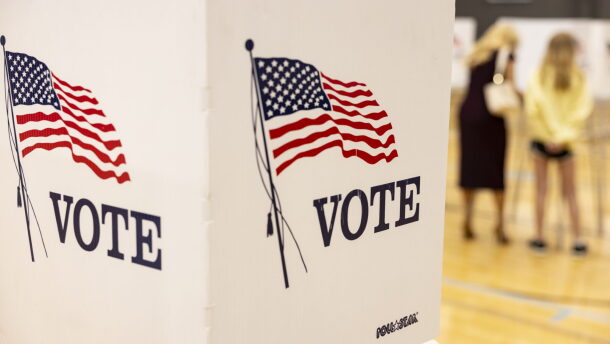 A woman votes with her child at the Michael O. Buchanon park voting location in Bowling Green, Ky., on Tuesday, May 21, 2024. (Austin Anthony for The Kentucky Lantern)