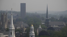 Remnants of a smokey haze above the New Haven city skyline as smoke from Canadian wildfires move over the state on June 8, 2023. Air quality levels were at unhealthy levels, with officials advising residents to stay inside and keep their windows shut.
