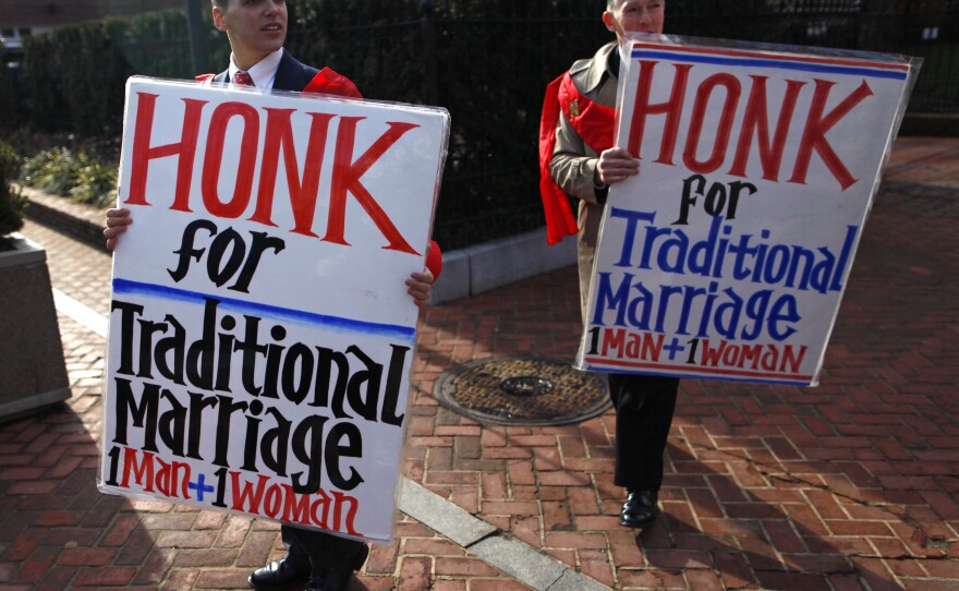 Zachariah Long (left) and Edward Ritchie protest against a gay-marriage bill in Annapolis, Md., on Feb. 17. The bill passed, but the issue is being put directly to Maryland voters on Nov. 6.