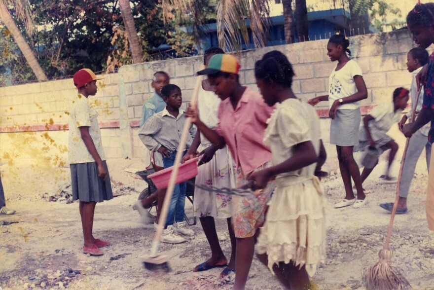 In this 1991 photo, children play in a courtyard during an activity organized by the Association for Brotherly Love, a nonprofit started by Dr. Geralde Gabeau and her husband Evans Gabeau.