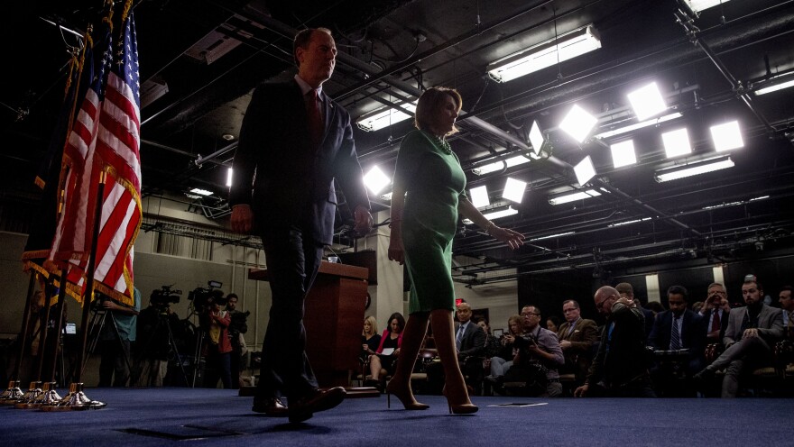 Rep. Adam Schiff, D-Calif., chairman of the House Intelligence Committee and House Speaker Nancy Pelosi of Calif., leave after speaking about the House impeachment inquiry into President Trump on Capitol Hill on Tuesday.