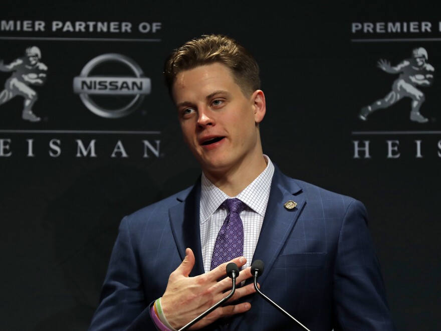 LSU quarterback Joe Burrow described the poverty of his Ohio hometown in his Heisman trophy acceptance speech. Since then, donations from across the U.S. have flooded to the Athens County Food Pantry. [Adam Hunger / Getty Images]