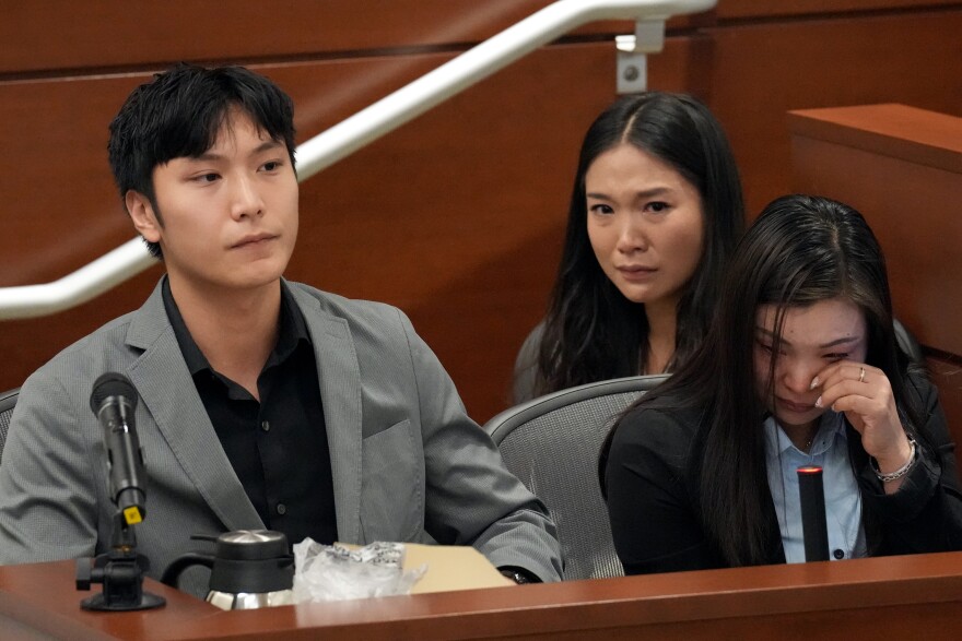 Aaron Chen gives his victim impact statement as his aunt, Hui Wang, right, and her niece, Lin Chen, become emotional during the penalty phase of the trial of Marjory Stoneman Douglas High School shooter. (Amy Beth Bennett/South Florida Sun Sentinel via AP, Pool)