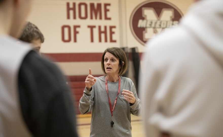 Montrose head coach Tracie McComb speaks to the team during practice.