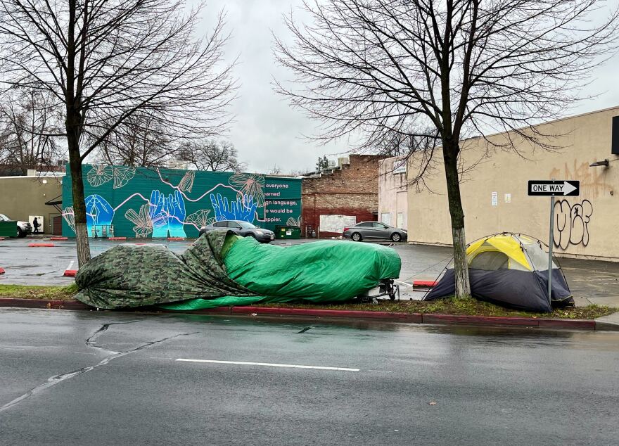 Unsheltered residents camping on E. 1st Street near the former 7-Eleven in downtown Chico, Calif., on Jan. 9, 2023.