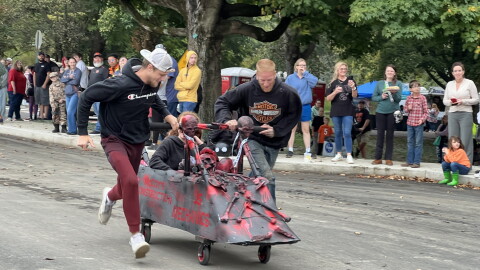 A team sprints down the track at the annual Chillicothe Coffin Races.