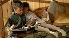 children reading a book