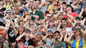 CARBONDALE, IL - AUGUST 21:  People watch the solar eclipse at Saluki Stadium on the campus of Southern Illinois University on August 21, 2017 in Carbondale, Illinois.  (Photo by Scott Olson/Getty Images)