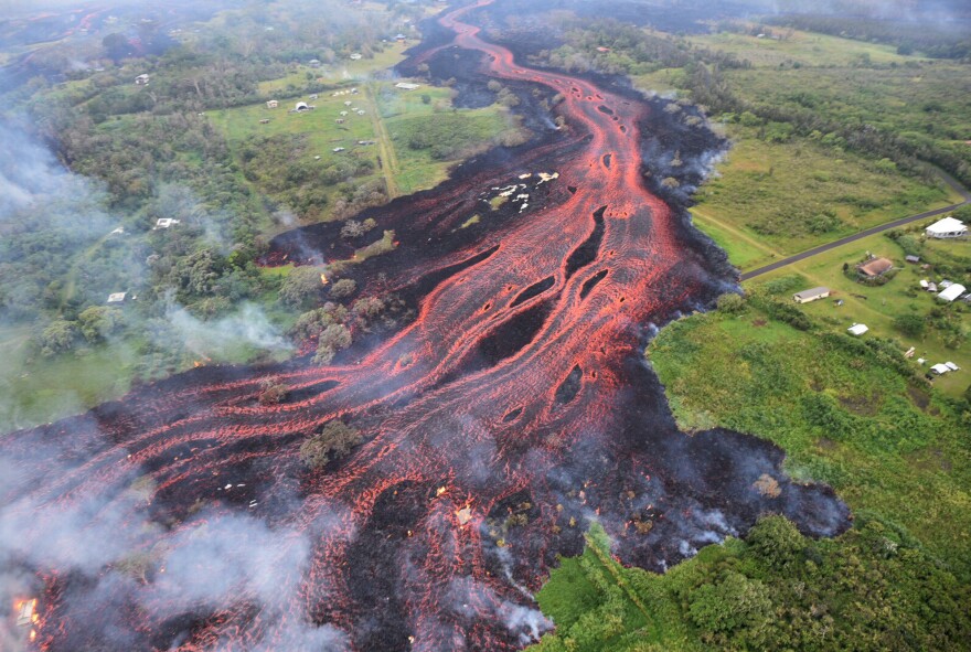 Lava flows from fissures near Pahoa, Hawaii, on Saturday.