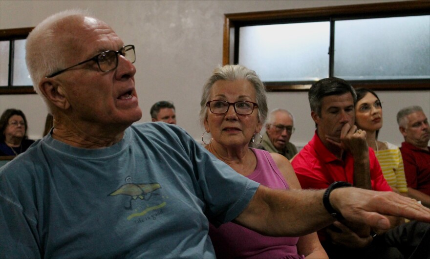 Residents listen as Frank Holby speaks during a community meeting about protecting Tomoka Farms Village on September 5, 2024.