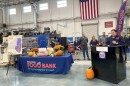 Regional Food Bank CEO Tom Nardacci announcing the food bank's Thanksgiving meal distribution initiative at the Institute for Advanced Manufacturing at Clinton Community College.