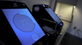 A Rapid DNA testing machine displays 77-minutes remaining on a 90-minute test. The use of rapid DNA testing is becoming more widespread across Connecticut as an evidentiary tool and lab director Cheryl Carreiro emphasizes their use is “pro-science, not pro-prosecution.” “It’s something we take personally because we are the scientists,” she says.