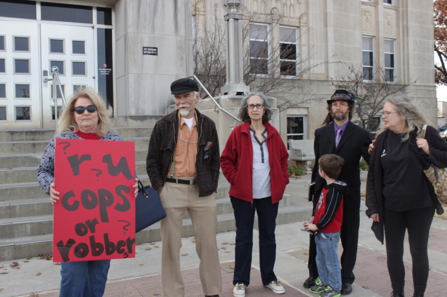 Supporters of Norman City Councilman Stephen Holman stand outside the Cleveland County Courthouse Dec. 11 during Holman's arraignment