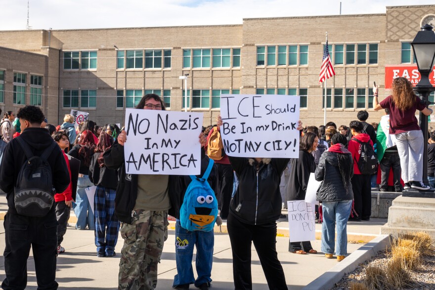 Two East High School students stand outside of the school during a protest of federal immigration enforcement, Feb. 6, 2026.