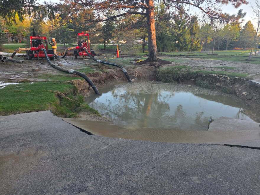 Water stands at the site of a 42-inch water main break in Auburn Hills on May 10, 2026.