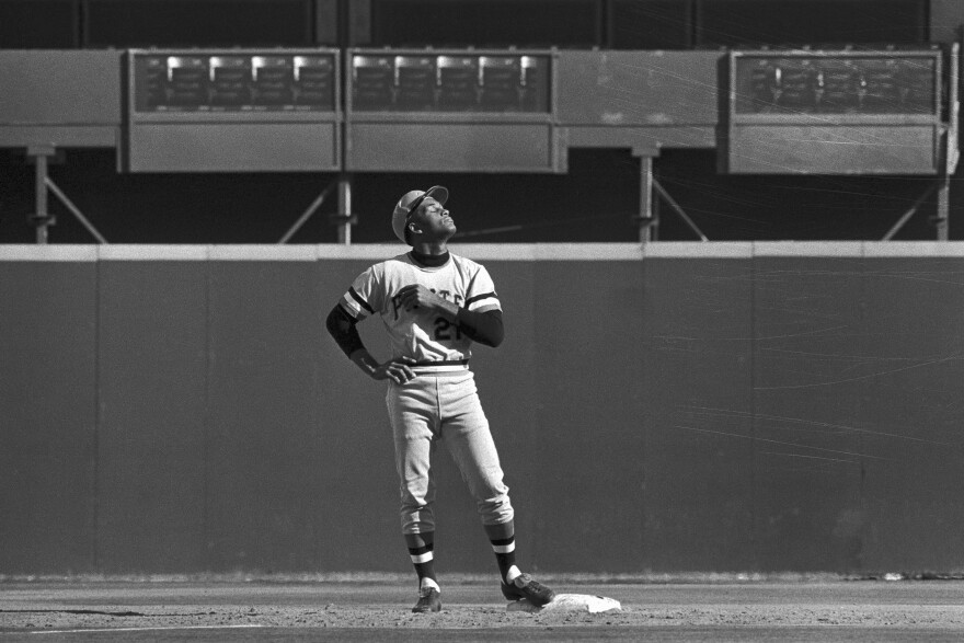 Roberto Clemente raised his face toward the sun after passing the 3000-hits mark in 1972. Clemente is the first Latin American to enter the National Baseball Hall of Fame and Museum.