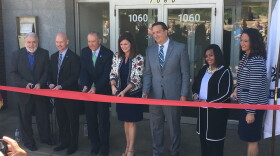City officials and members of the United Way of Summity County cut the ribbon on the nation's 20th Financial Empowerment Center.