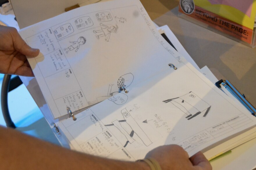 Students created different sketches and ideas of which scenes they wanted to represent with their exhibit model. One of English Landing Elementary School's teams planned out how to make “The Smallest Girl in the Smallest Grade” come to life.