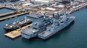 An aerial view of German Navy frigate FGS Baden-Württemberg, right, and German Navy Berlin-class replenishment ship FGS Frankfurt Am Main, moored at Joint Base Pearl Harbor-Hickam, Hawaiʻi, during Exercise Rim of the Pacific 2024, July 3.