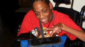 Tres Whitlock types on the DynaVox tablet that serves as his voice. Whitlock, 17, has cerebral palsy and can't speak on his own. He is trying to enroll in a Hillsborough County charter school, but has yet to enroll because of concerns about the therapy and services he needs.