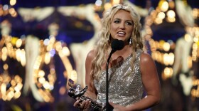 FILE - Britney Spears accepts the award for best pop video at the MTV Music Awards in Paramount Pictures Studios in Los Angeles on Sunday, Sept. 7, 2008. (AP Photo/Matt Sayles)