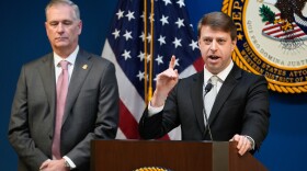 U.S. Attorney for Western District of North Carolina Russ Ferguson speaks next to FBI Special Agent James C. Barnacle, Jr. during a press conference, Friday, Jan. 2, 2026, in Charlotte, N.C.