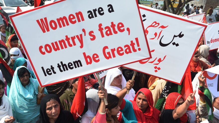 Supporters of the Pakistan Peoples Party chant slogans as they march in Lahore to mark International Women's Day.