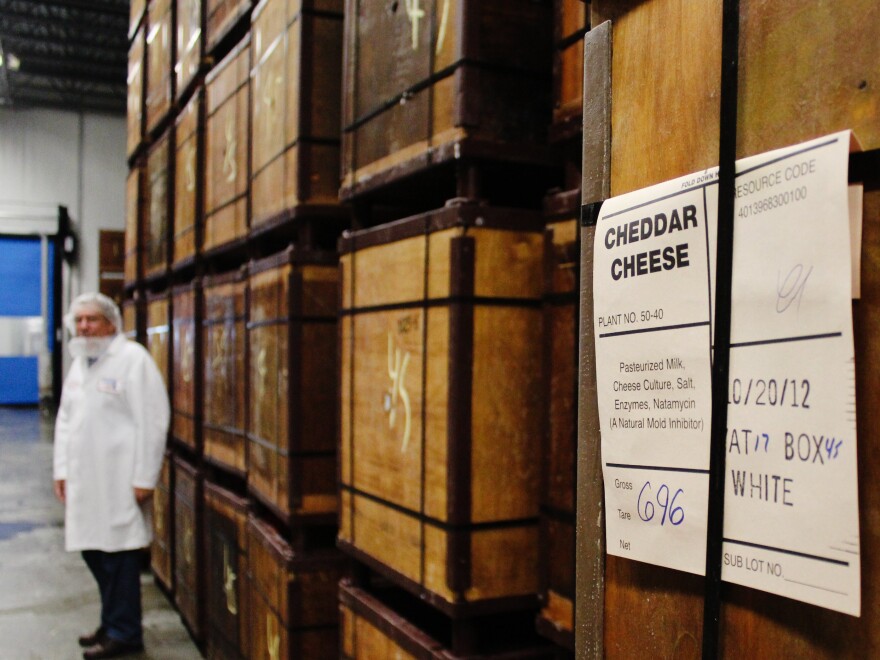 Wooden containers hold 640-pound blocks of cheddar cheese.