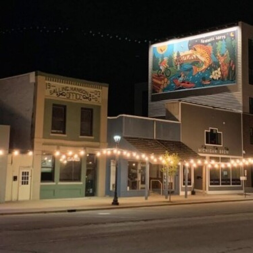 The Sawmill mural on the side of the new building in downtown Grayling.
