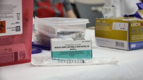 A photo of a box of MMR vaccines